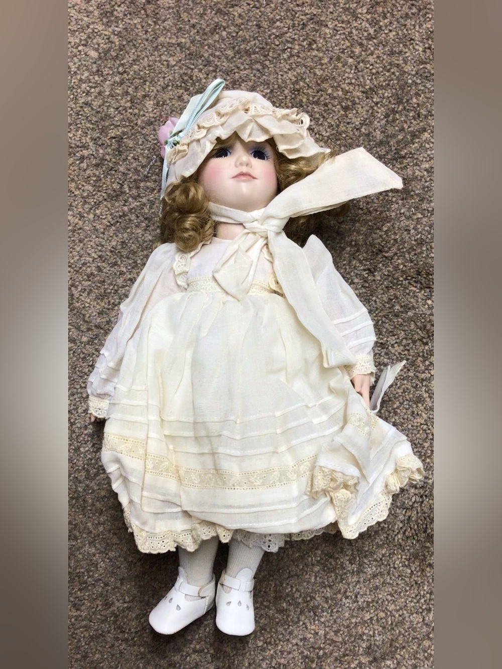 Classic Porcelain Doll in Cream Dress with Hat